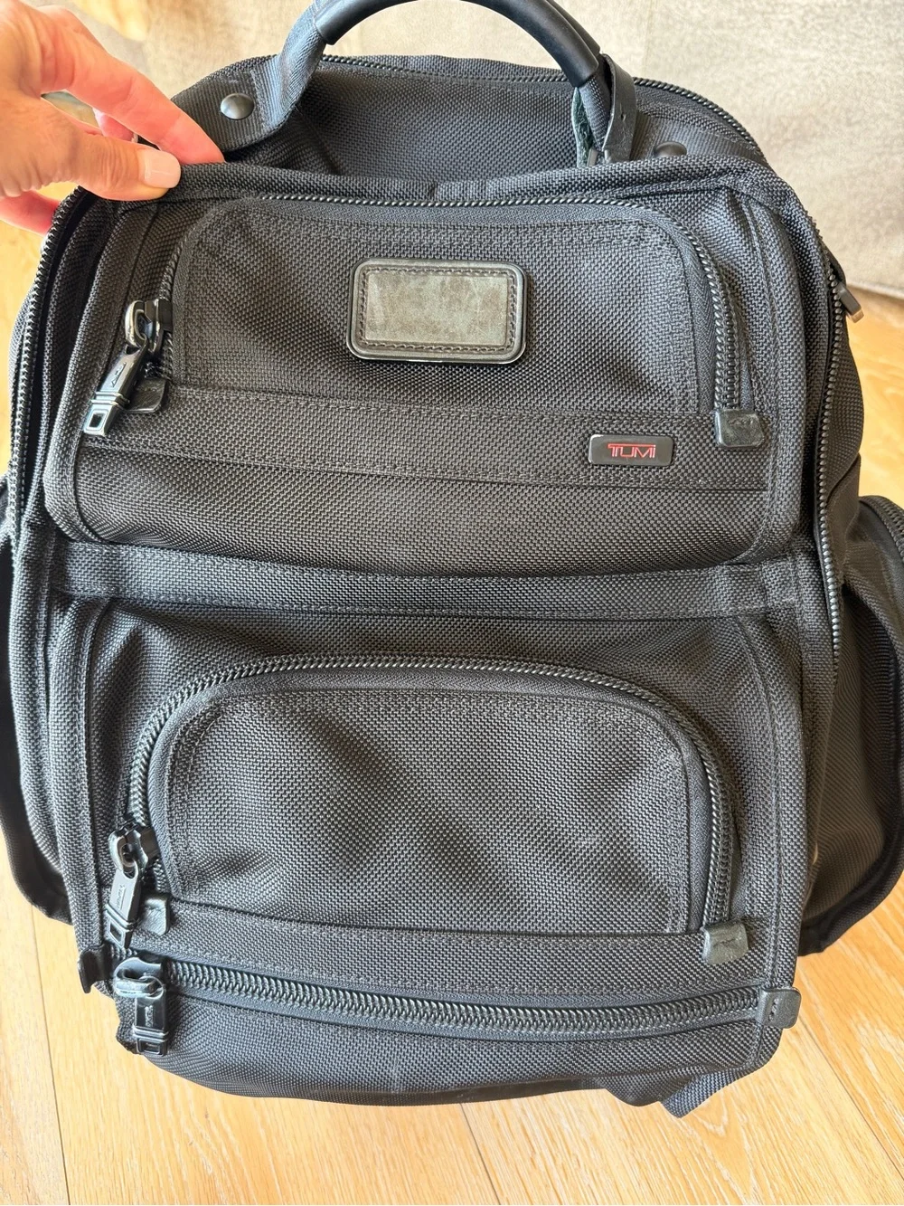 TUMI Black T-pass Nylon Men's Travel Backpack with Multiple Pockets